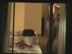 Japanese hotties caught naked through the window